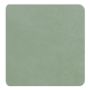 Detailopname van het mintkleurige Displine Alcantara® inlegpaneel met een zachte textuur.