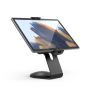 Zijaanzicht van de Compulocks Core Cling tafelhouder met een tablet in gebruik, met een moderne, elegante uitstraling.