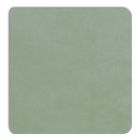 Detailopname van het mintkleurige Displine Alcantara® inlegpaneel met een zachte textuur.